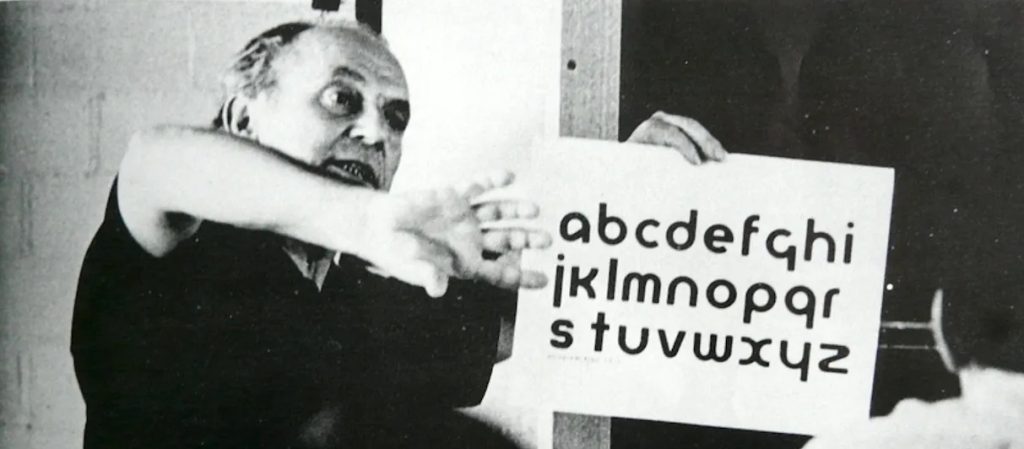 Participant of ATypI Working Seminars holding Bayer’s Universal Alphabet